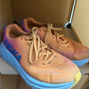 Hoka Vibrant Orange and Blue Athletic Shoes